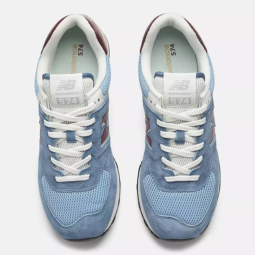 New Balance 574 in a cream blue and red